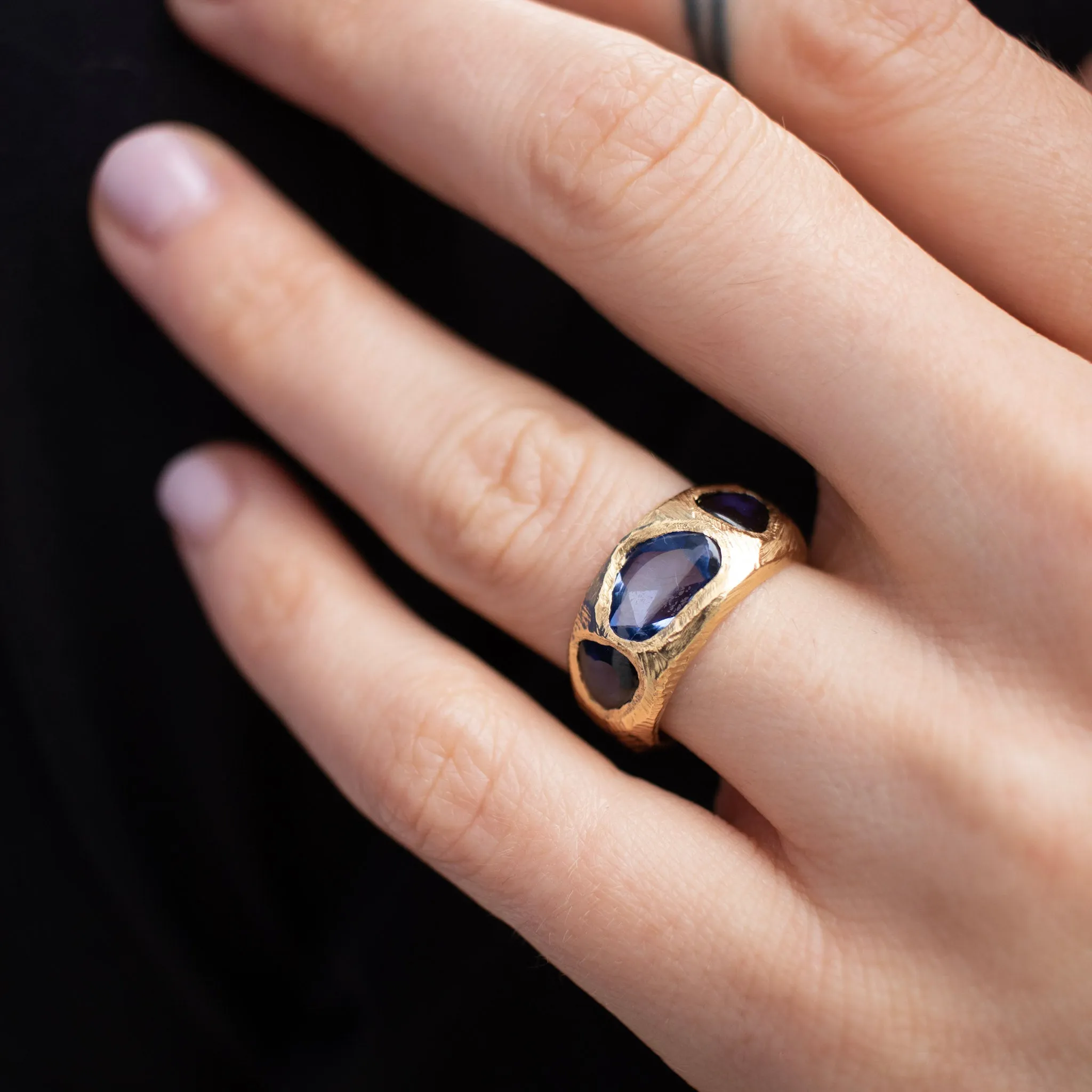 18K Three Stone Ring in Light and Dark Blue Sapphires