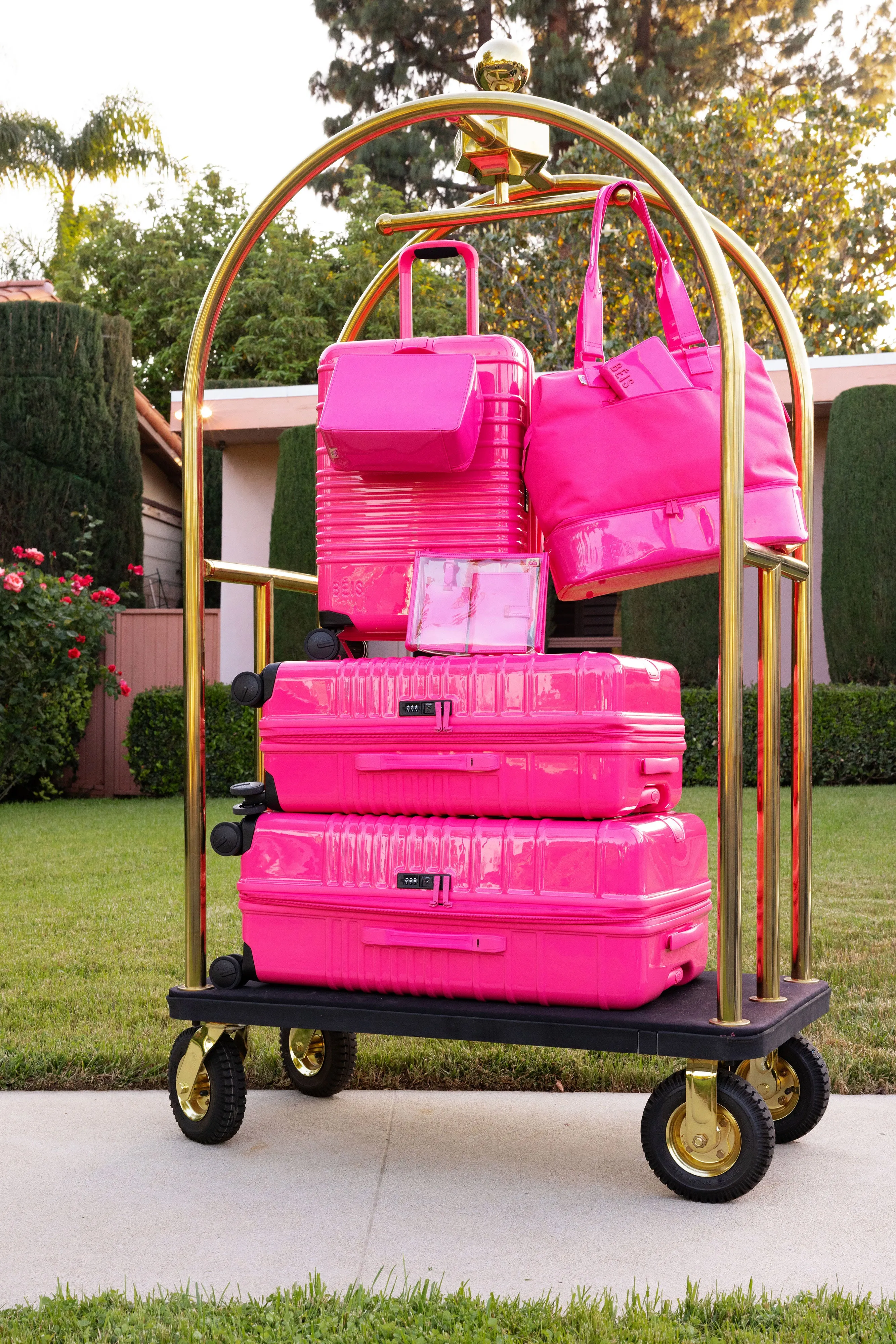 The Large Check-In Roller in Barbie Pink