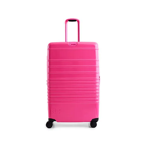 The Large Check-In Roller in Barbie Pink