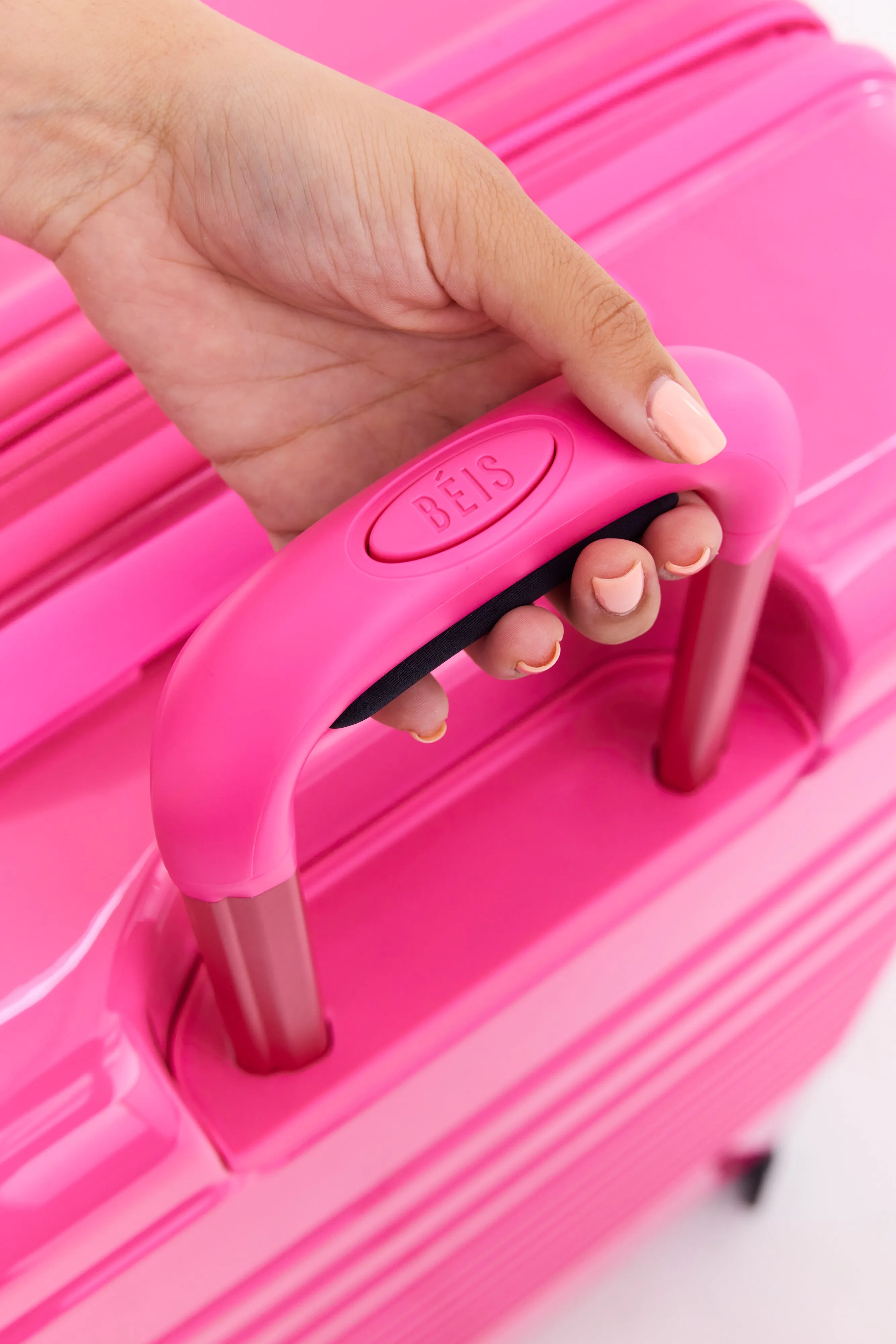 The Large Check-In Roller in Barbie Pink